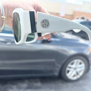 White Gucci Sunglasses.  Great Condition. Purchased at Saks.